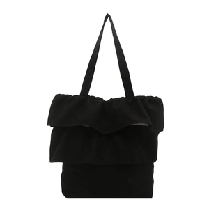 Black canvas tote bag featuring stylish large double ruffles for daily casual and school use
