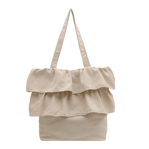 Chic beige canvas tote bag with ruffle layers and large capacity for daily use