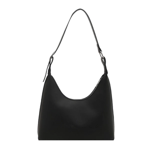 Minimalist black crescent shoulder bag with adjustable silver buckle and smooth matte leather