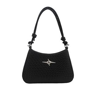 Minimalist black woven shoulder bag with silver star hardware and knotted strap