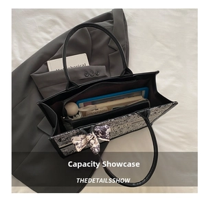 Interior view of floral tote bag showing large capacity for tablet and accessories