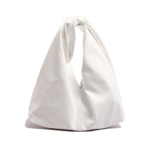 Minimalist white pleated bucket bag with a knotted handle for versatile daily commuting