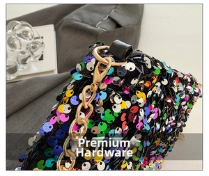 Macro detail of vibrant colorful sequins and gold chain hardware on a bucket bag
