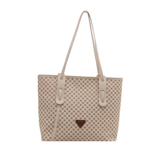 Sac cabas beige minimaliste avec motif géométrique et poignées en cuir élégantes