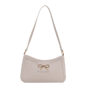 Elegant off-white croc-embossed underarm bag with gold bow clasp and shoulder strap