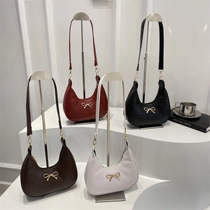 French woven hobo bags in four colors with elegant golden bow metal hardware accents