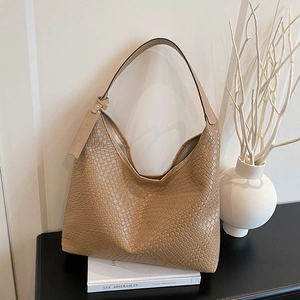 Khaki woven leather tote bag with large capacity for stylish daily commuting wear
