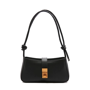 Minimalist black faux leather underarm bag with vintage gold buckle and knotted shoulder strap