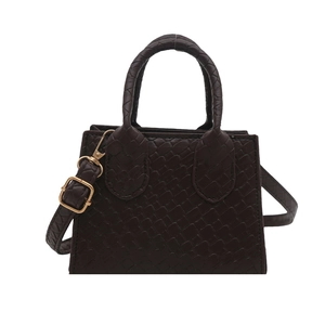 Deep brown woven leather crossbody bag with top handles and golden hardware detailing