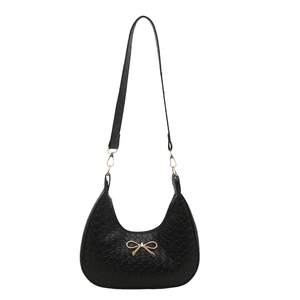 Urban minimalist black woven hobo shoulder bag with a decorative gold metal bow