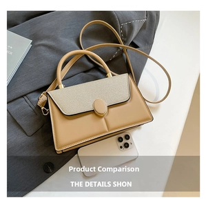 Detail view of khaki and beige woven crossbody bag with gold clasp next to a phone