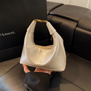 Retro cream white dumpling bag in oil wax leather with metallic buckle for women