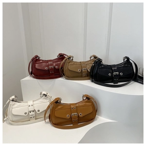 Five vintage Y2K faux leather shoulder bags in burgundy, khaki, black, white, and brown