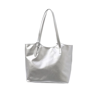 Minimalist silver metallic tote bag with high-gloss finish and slim shoulder straps