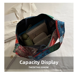 Detail showing the spacious interior of the ethnic patchwork tote bag with daily items