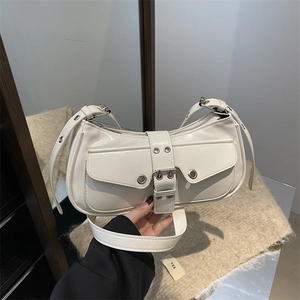 Chic cream underarm bag with decorative silver buckles and double front flap pockets