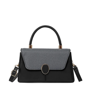 Elegant color-block top handle bag in black leather and grey fabric with gold hardware