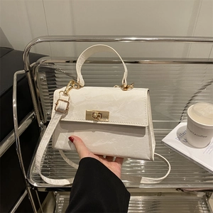 White marble texture leather trapezoid handbag with gold lock and adjustable strap
