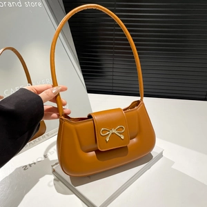 Caramel bow-knot shoulder bag with metallic buckle and vintage flap design for women