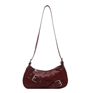 Dark red crescent underarm bag with silver belt buckle and adjustable shoulder strap