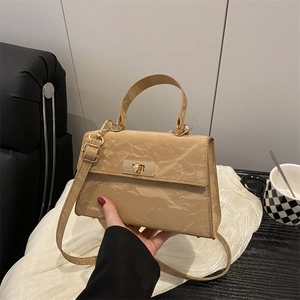 Fashionable khaki pleated leather handbag with golden lock and detachable shoulder strap