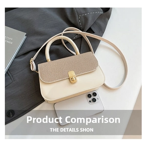 Detailed top view of cream small square bag with golden lock and smartphone for size scale