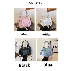 Borse retrò chic nei colori rosa bianco nero e blu con scritta NINO BAG a rilievo