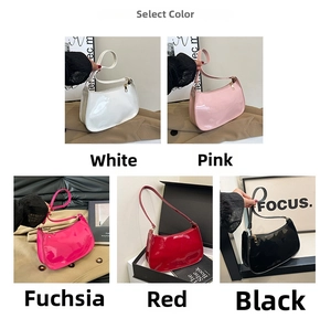 Detail view of glossy half-moon underarm bags in five stylish colors with gold zippers