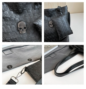 Detailed close-up of skull embossed matte leather tote bag and 3D metal skull hardware