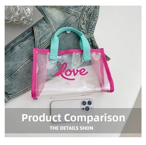 Detailed view of clear PVC tote with pink mesh trim and green handles for size reference
