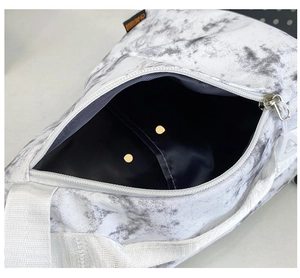 Detailed interior of nylon chest bag showing main compartment and inner pocket