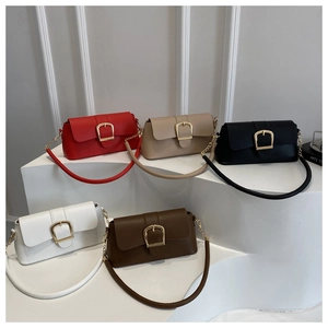 Detailed display of vintage underarm bags in five colors with large gold horsebit buckles