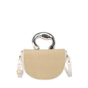 Minimalist straw patchwork saddle bag with unique silver organic handle and leather strap