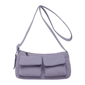 Minimalist lavender lavender crossbody barrel bag with adjustable strap and front pockets