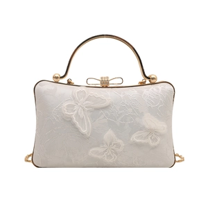 Elegant white embroidered evening bag with 3D lace butterflies and golden top handle