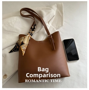 Brown tote bag with silk scarf handle and smartphone for size comparison