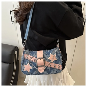 Y2K denim crossbody bag with pink star patches and silver metal chain detail
