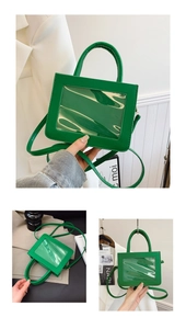 Detail view of green PVC patchwork handbag featuring transparent window and PU leather texture