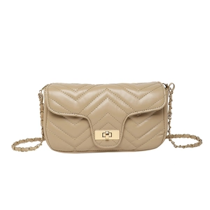 Quilted beige crossbody bag with V-shaped pattern and golden chain strap on white background