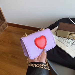 Mini purple heart crossbody bag for kids with gold chain strap and red heart design