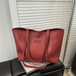 Minimalist red woven leather tote bag for women, spacious shoulder bag for commuting