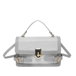 Gray leather and silver sequin crossbody bag with metallic twist lock and top handle