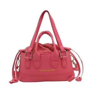 Fashionable pink drawstring handbag with litchi grain leather and golden lettering
