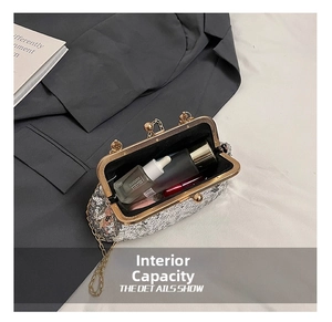 Interior view of silver sequin evening bag showing space for lipstick and perfume
