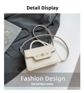 Detailed view of the elegant beige flap bag featuring a sleek gold bar lock mechanism