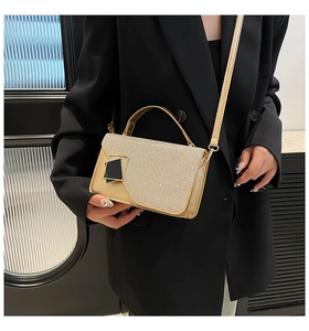 Detailed view of champagne gold mini square bag with rhinestones and metal buckle