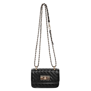 Classic black chevron quilted crossbody bag with gold chain strap and metal turn-lock