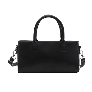 Petit sac carré noir minimaliste avec poignées et bandoulière réglable pour femme
