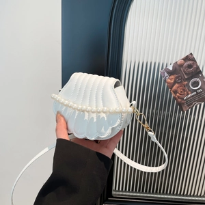 Elegant white shell bag with pearl handle and textured faux leather finish