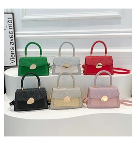 Glittery crocodile texture mini bags in six colors with gold pebble buckles